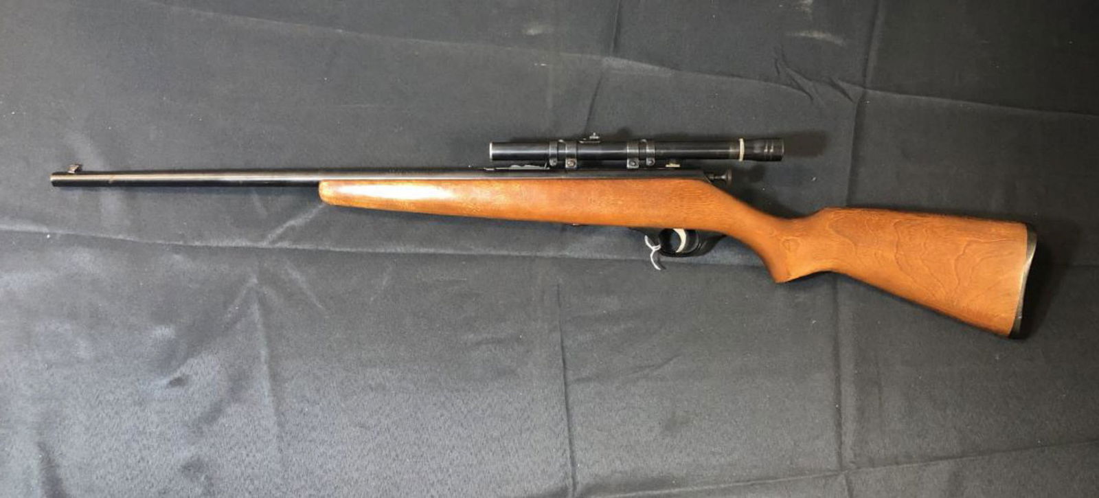 JC Higgins. 22 S L LR Model 41 Bolt Action Rifle: JC Higgins .22 cal S.L. & LR Model 41, Single Shot Bolt Action Rifle Blue Finish with Wood One Piece Stock. 22" barrel with ramp rear sight & blade front. Chrome bolt handle with blued plunger. It fea