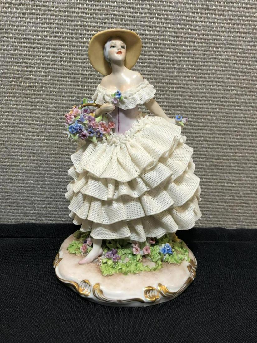 Capodimonte Fabris Figurine Flower Basket Lady: Capodimonte Fabris Figurine Flower Basket Lady. Measures about 6" at its highest, and about 4" at its widest. Everything seems intact on this one. Red hallmark on bottom.