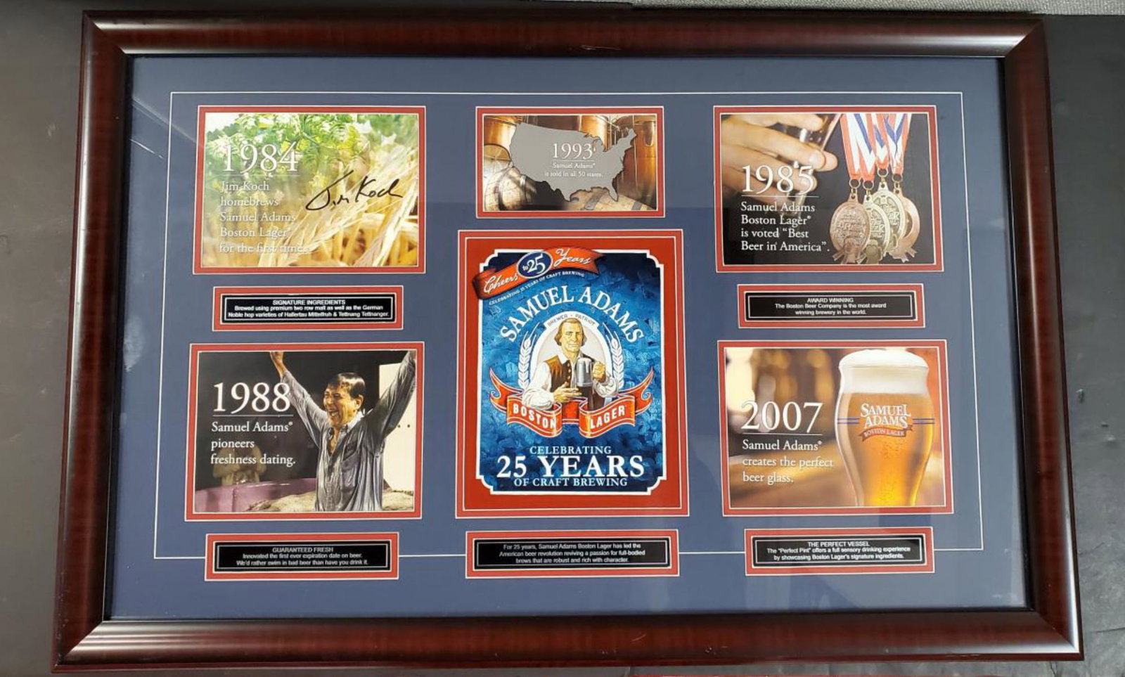 Sam Adams Framed Under Glass Jim Koch Autograph: Samuel Adams Framed & Matted Under Glass Celebrating 25 Years of Craft Brewing. Jim Koch Autographed. Jim Koch signed this with a black marker. This great breweriana collectible is gorgeously arranged