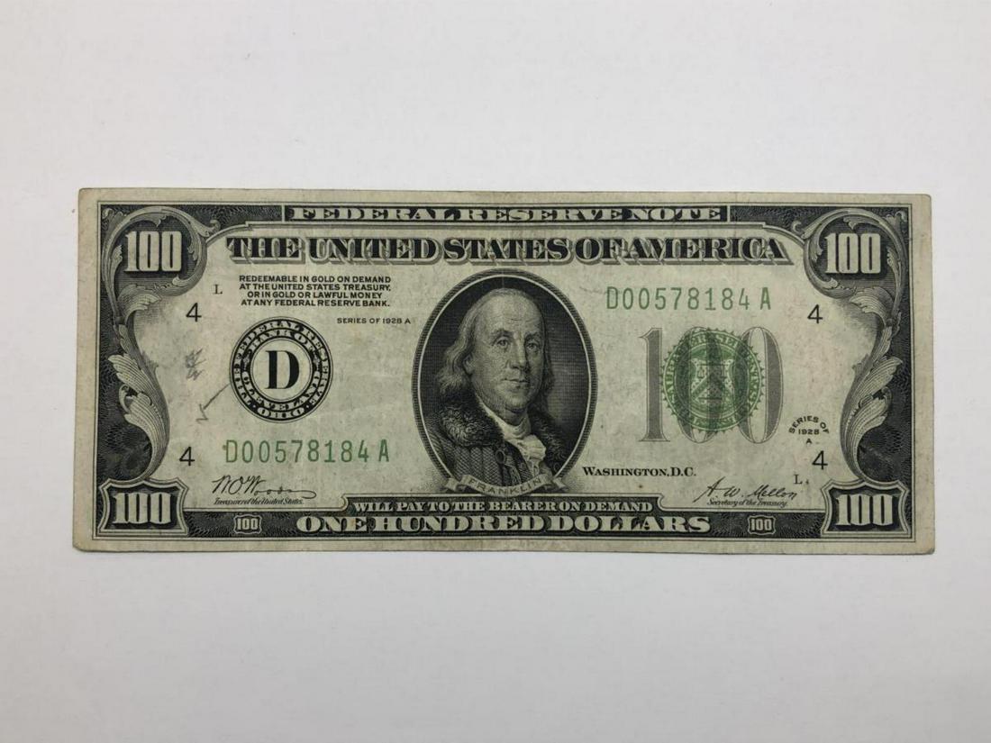 1928A $100 "Redeemable in Gold" Currency Note: 1928A $100 "Redeemable in Gold" Currency Note. From the Cleveland Federal reserve, and featuring the letter D, this note has seen some circulation and is in Fine condition