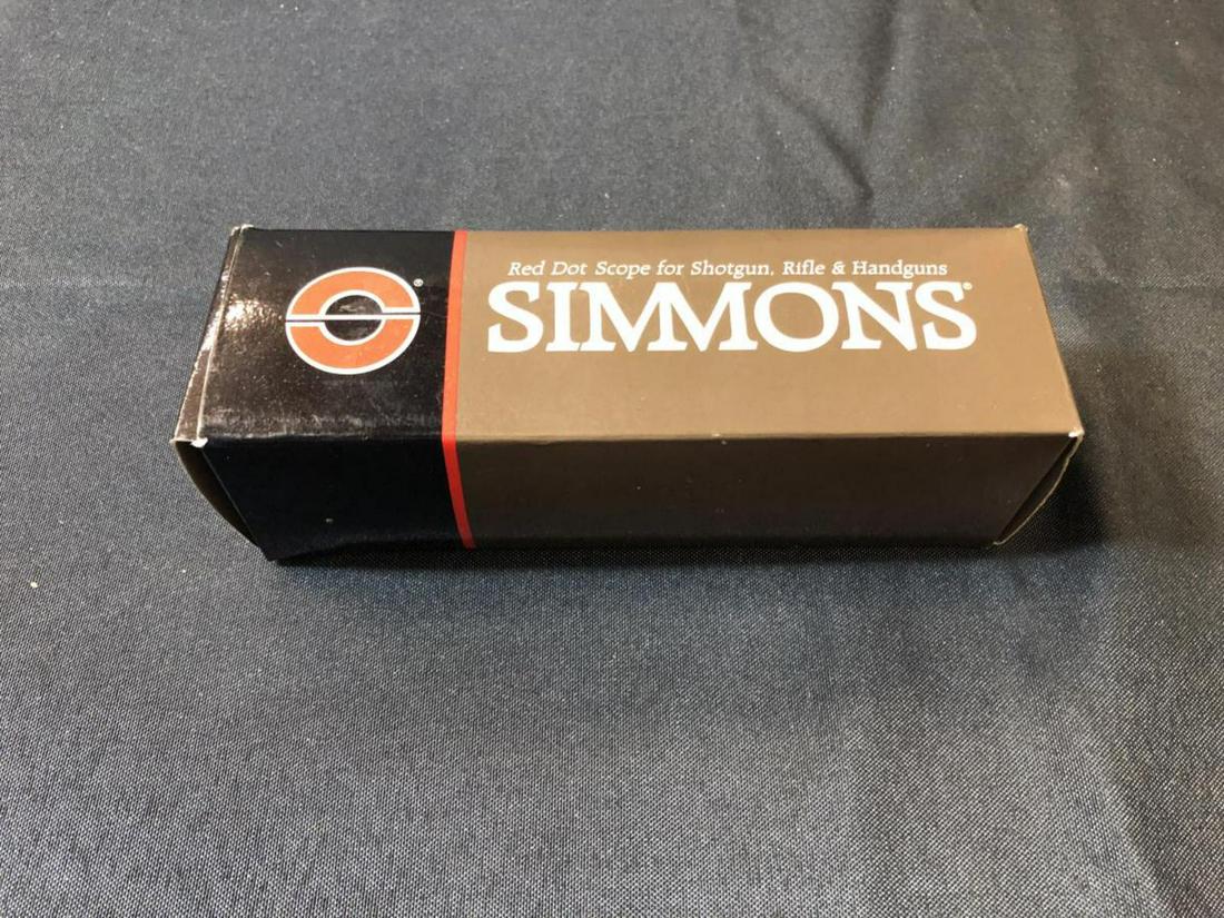 Simmons Red Dot Scope in Box Model 51105: Simmons Red Dot Scope in Box Model #51105 with Weaver Type Mounts. Included is the multi language instruction booklet & care cloth. Great condition & appears to have never been mounted. It has a batte