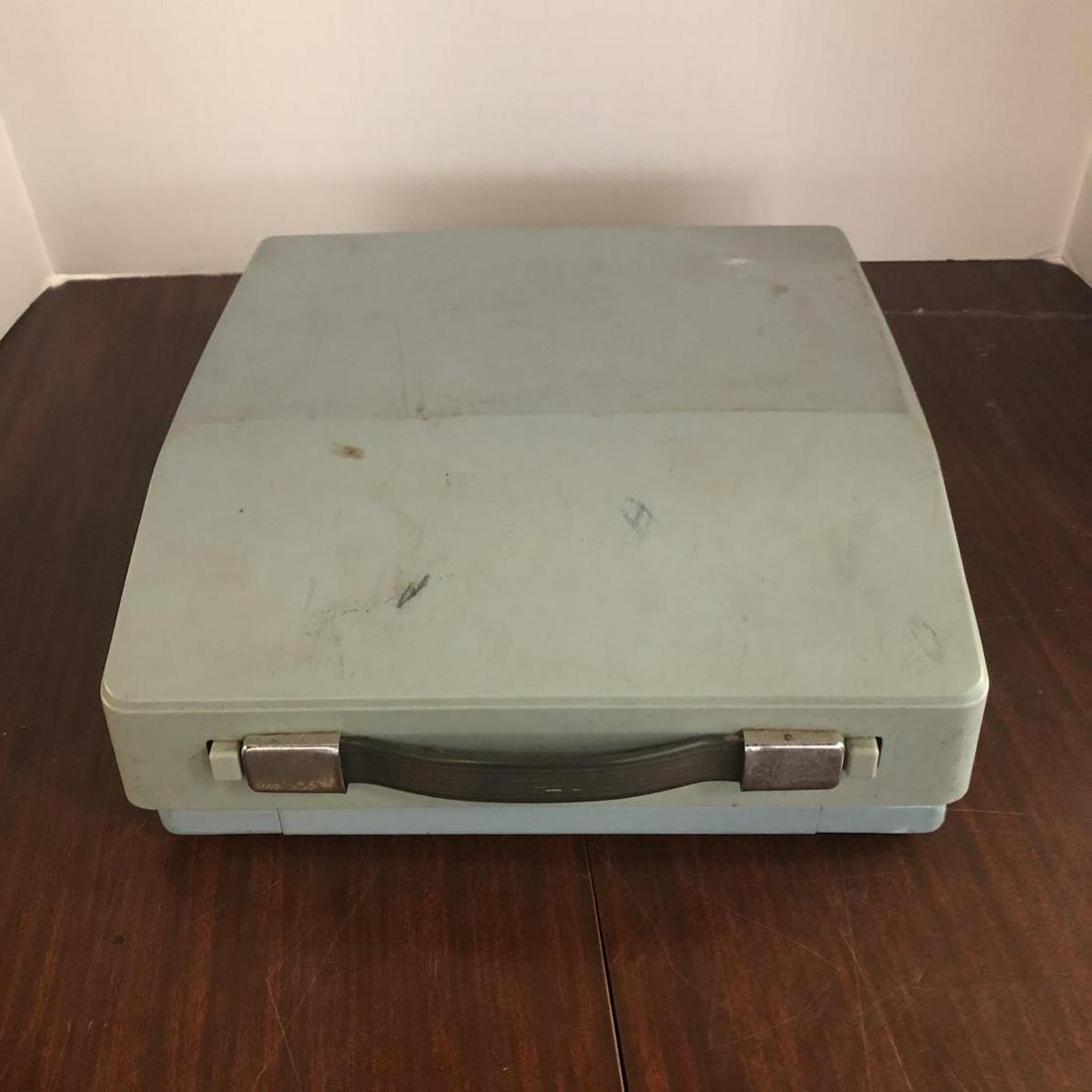 Royal Typewriter In Case Model No S 2245390: Royal Typewriter In Case. Typewriter and case has a light blue color. Key are in working condition. Made in Japan. No S 2245390 printed on the back. Cover has some marks on it.