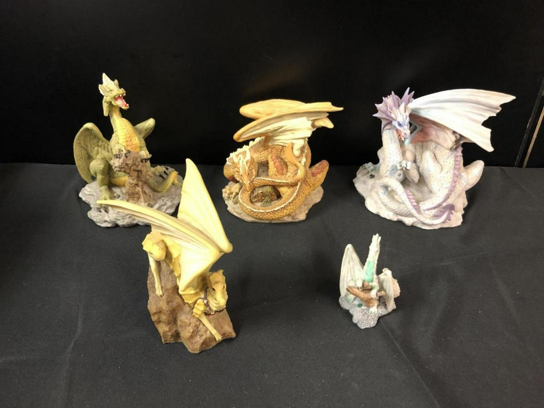 Lot Of Enchantica Dragon Figurines: Lot Of Enchantica Dragon Figurines. Total of 5 figurines in the lot. Dragons made in England. Consists of Green & Yellow Large Dragon measuring 7"x9". White & Light Blue Large Dragon Measuring 7"x7".