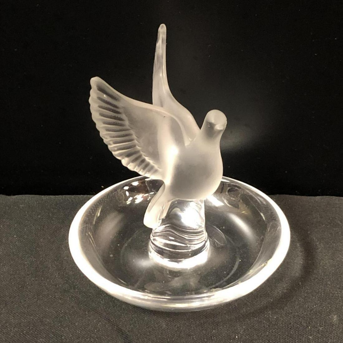 Lalique Ring Holder With Bird: Lalique Ring Holder With Bird. Stands 4" tall. Bird spreading it's wings. Lalique etching on the bottom.