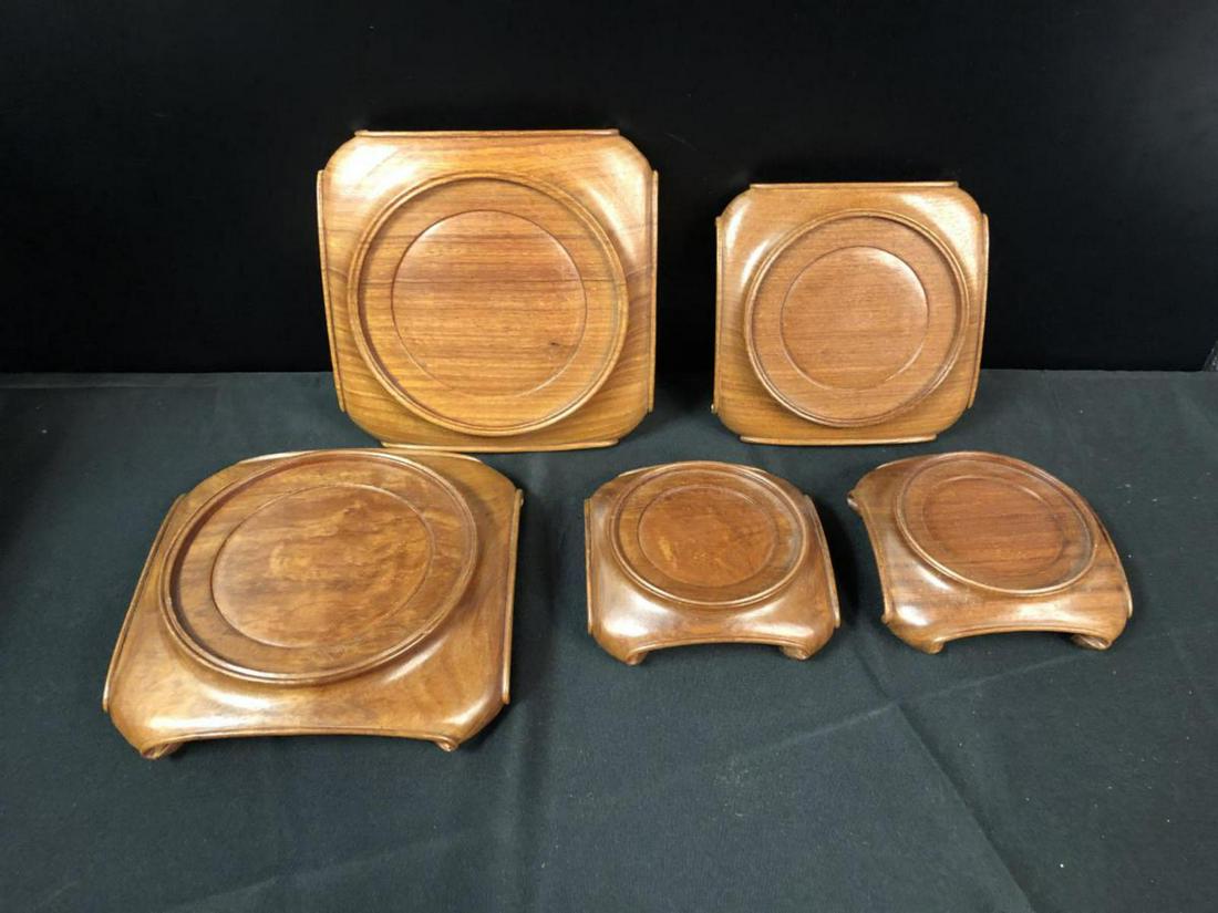 Lot Of Assorted Square Wood Vase Stands: Lot Of Assorted Wood Vase Stands. Total Of five wood stands in the lot. They range in sizes and in width.