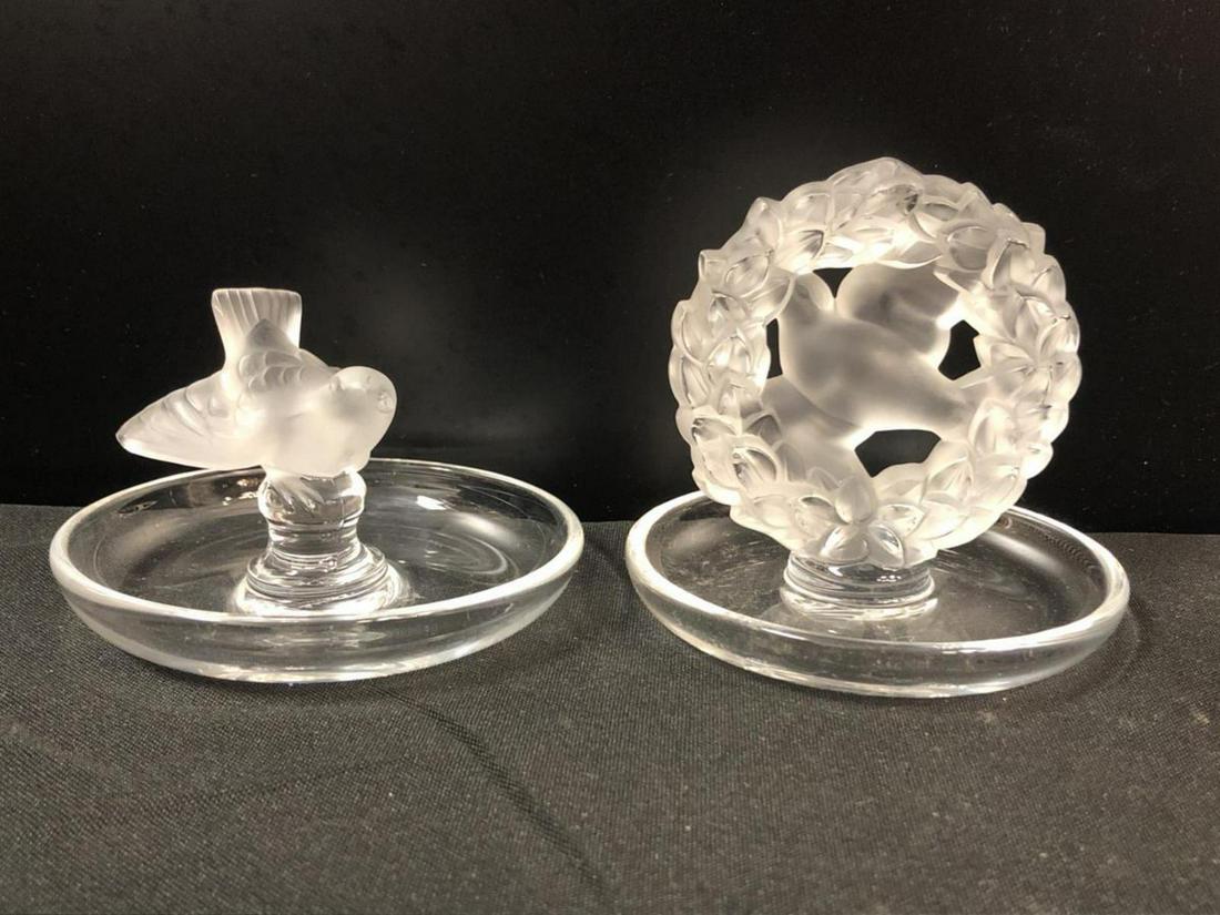 Pair Of Lalique Ring Holders: Pair Of Lalique Ring Holders. Bird in a wreath standing 4" tall. Sparrow standing 3" tall. Lalique etching on the bottom.