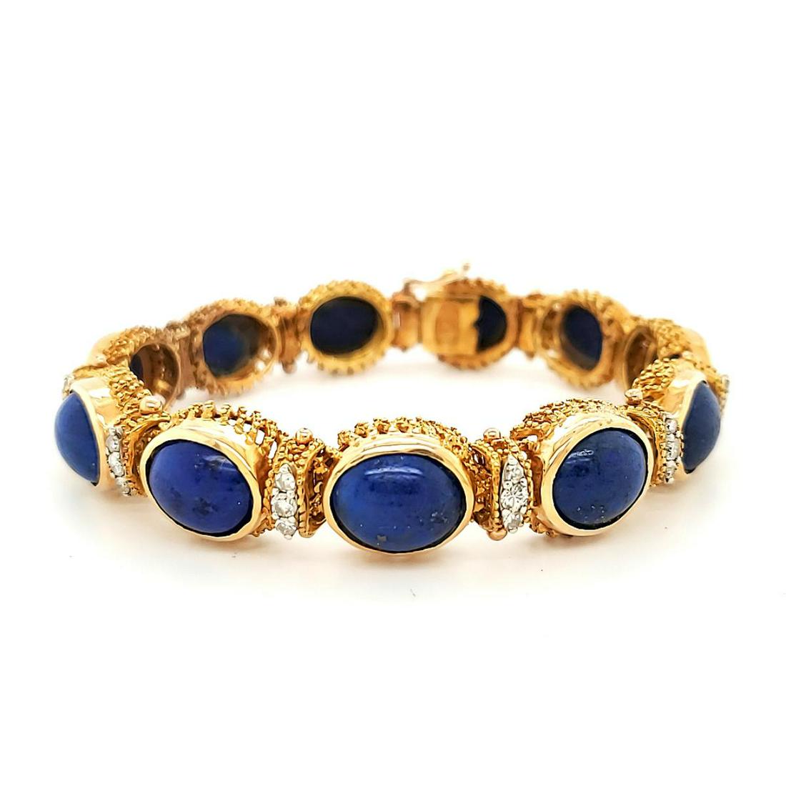 18kt yellow gold lapis lazuli and diamond bracelet: Ladies 18kt yellow gold lapis lazuli and diamond bracelet containing bezel set oval cabochon cut lapis lazuli, separated with prong set single and round brilliant cut diamonds weighing approx. 1.10ct.