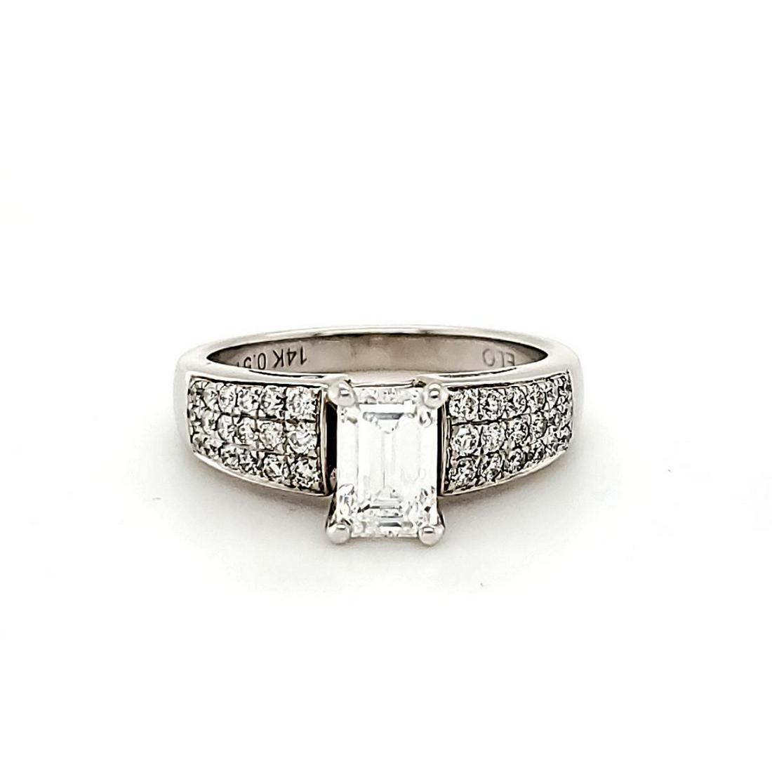 1.02ct Diamond Engagement Ring, GIA: Ladies 14kt white gold engagement ring with one 1.02ct emerald cut diamond, Clarity VS2, Color D, Good Polish and Very Good Symmetry, GIA grading report. Down each side from the center stone are 3 row