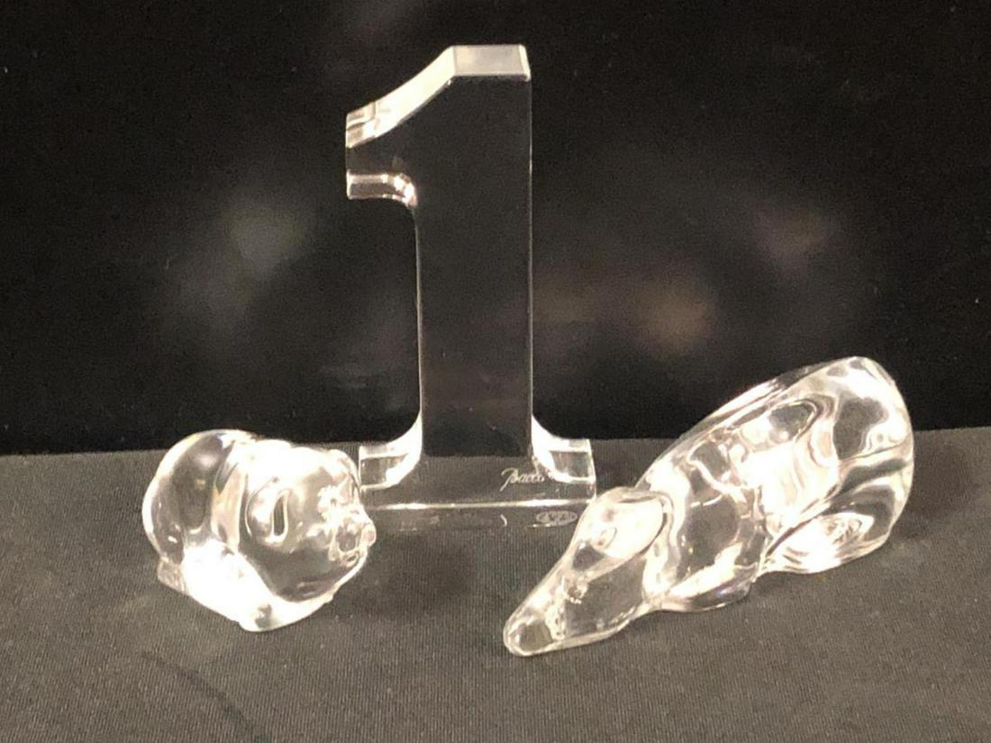 Baccarat Trio Of Crystal Figurines: Baccarat Trio Of Crystal Figurines. Consists of Pot Belly Pig Standing 1 1/2" tall. Rat standing 1 1/2" tall. The number 1 standing 4" tall. Baccarat etching on the bottom of each piece.