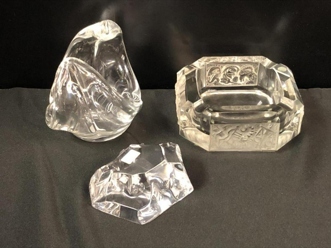 Lot Of Crystal Misc Collectibles: Lot Of Crystal Misc Collectibles. Three total crystal pieces in the lot. Val Lambert Abstract Art Figurine. Stands 2" tall. Measures 4" across. Val Lambert etching on the bottom of the figurine. Sevre