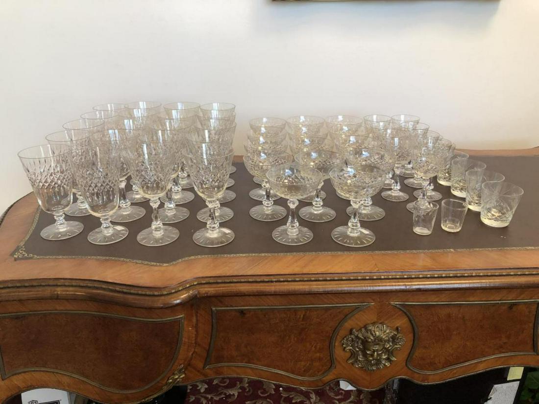 Lot Of Cut Crystal Glassware: Lot Of Cut Crystal Glassware. Total of 51 pieces in the lot. Consists of 6 cocktail glasses standing 2 3/4" tall. 2 shot glasses standing 2 1/4" tall. 9 cordial glasses standing 5" tall. 14 champagne 