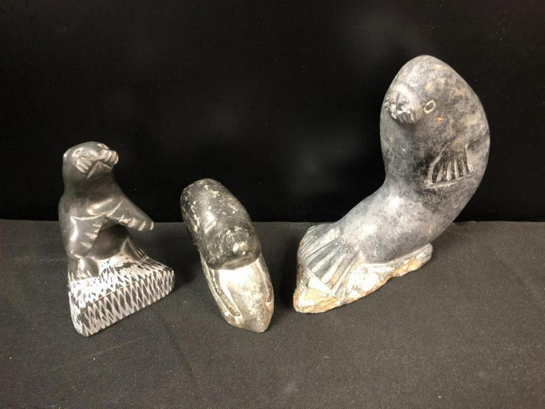 Soapstone Stone Seal Statues: Soapstone Stone Seal Statues. Three seal statues in the lot. One Stands 3" tall and measures 3 1/2" across. Second one measures 4" tall and measures 3 1/4" across. Third one stands 6" tall and measure
