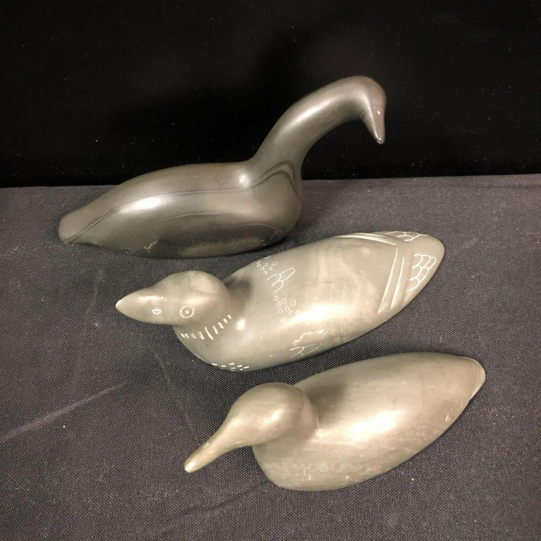 Soapstone Stone Duck Statues: Soapstone Stone Duck Statues. Three ducks in the lot. First duck stands 3 3/4" tall and measures 6" across. Second duck stands 2" tall and measures 6" across. Third duck stands 2" tall and measures 3"