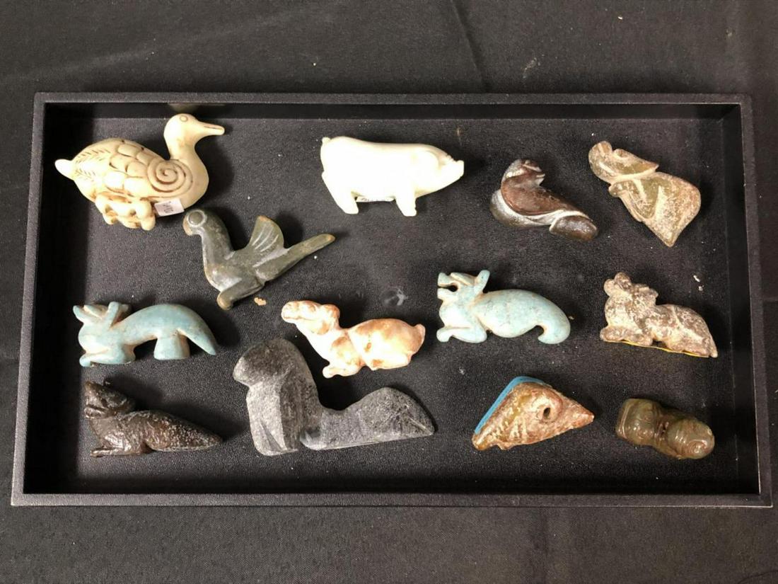 Lot Of Soapstone Stone Misc Collectibles: Lot Of Soapstone Stone Misc Collectibles. 13 total pieces in the lot. Ranges from duck, pig, dragon, bird etc. Various sizes according to the pieces.
