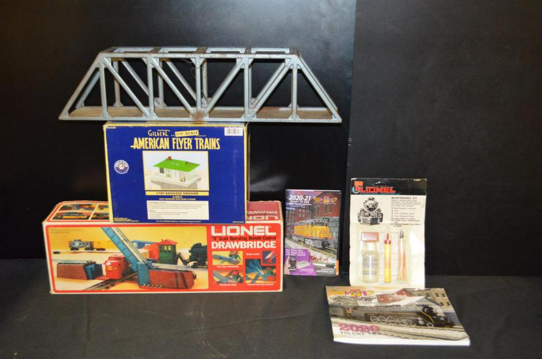 Lionel Train Set Collectibles: Lionel Train Set Collectibles. Consists of Lionel Maintenance Kit. Lionel "O" Scale Operating remote control drawbridge in the box. Lionel Gilbert American Flyer trains S Gauge #789 Baggage Smasher 6-
