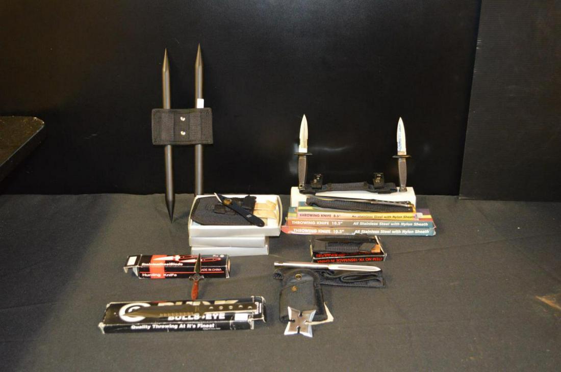 Group of New Throwing Knives & Throwing Stars: Group of New in the Box Throwing Knives & Throwing Stars. This group will include 2-pouches with 4 stars each, 2-large stars in pouches in boxes, 2-sets of 3 knives each in pouches in boxes, 4-knives 