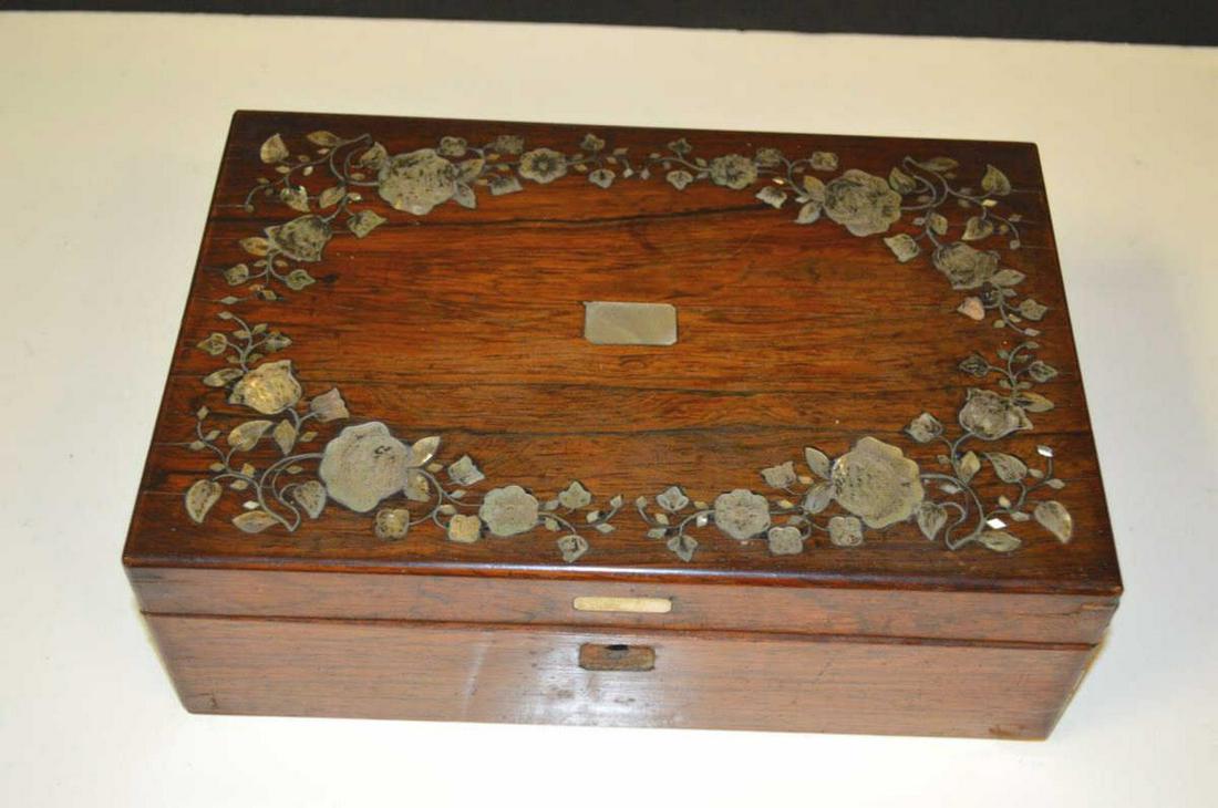 Vintage Wooden Document Box: Vintage Wooden Document Box. Mother of pearl inlay on top of the box. Escutcheon missing. Comes with key. Stained finish to the wood box. Measures 11 1/4"x 7 1/4"x4 1/4". A couple of nicks on the box 
