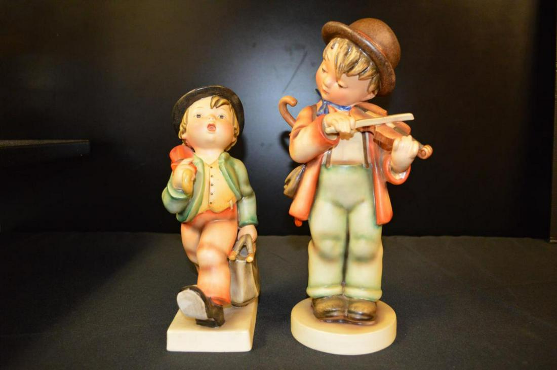 Pair Of Large Hummel Figurines: Pair Of Large Hummel Figurines. Goebel Hummel Germany Vintage Figurine" Merry Wanderer". Stands 10 3/4" tall. Goebel Hummel Boy Playing Fiddle Violin Christmas Germany TMK5 1972. Stands 13 1/2" tall.