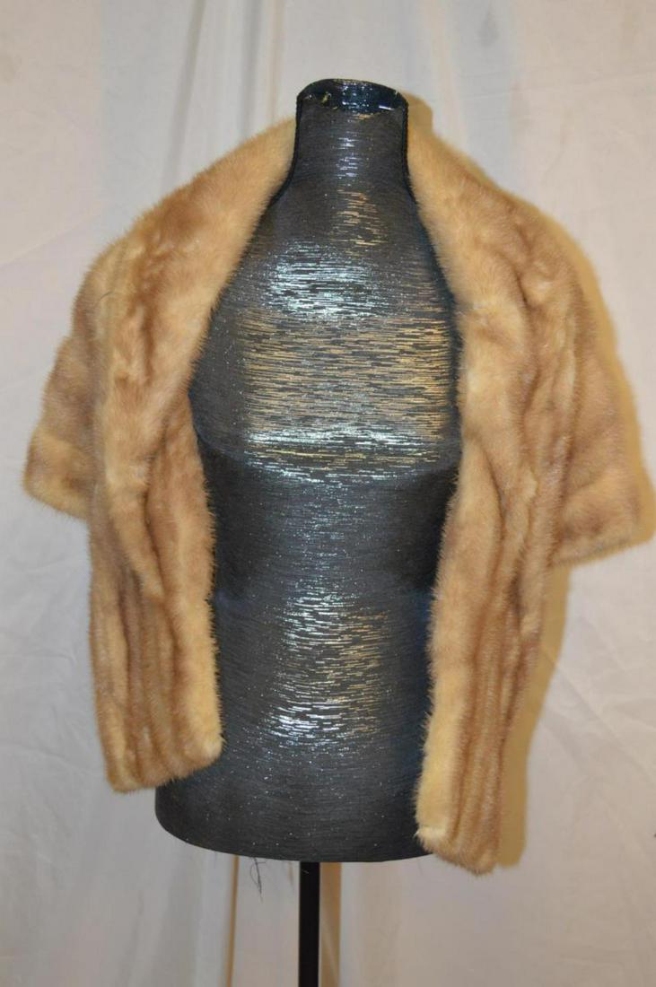 Ladies Vintage Light Caramel Colored Mink Stole: Ladies Vintage Light Caramel Colored Mink Stole. This great stole has one front metal button & two front breast pockets, it has a fully lined front & horizontally striped reverse. It is an approx. siz