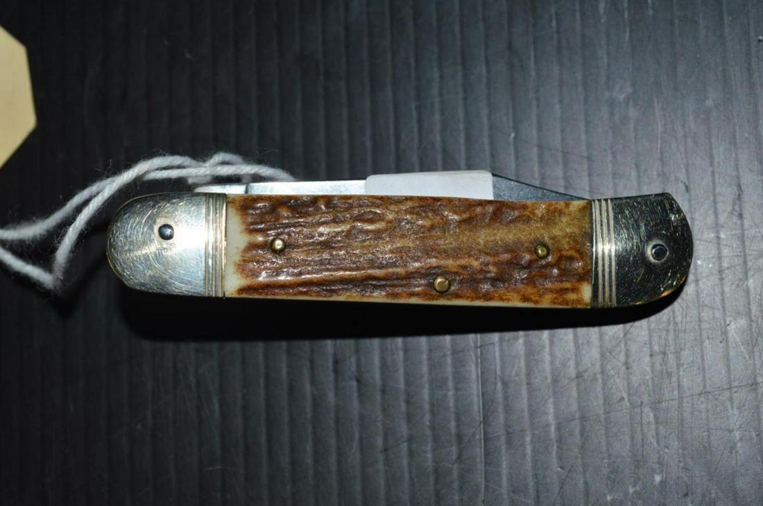 Hubertus Vintage Automatic Open Stag Flick Knife: Hubertus Vintage Automatic Kris Flick Knife with Stag Handles, Brass Frame Arched blade. This great knife features a 2 1/2" polished double edged blade. It is 5 3/4" overall & 3 3/8" folded, 71 grams.