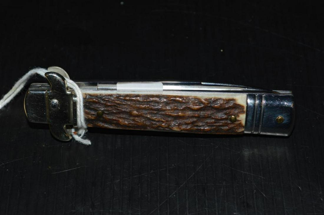 Bill DeShivs Leverletto Automatic Stag Handle Knif: Bill DeShivs Leverletto Automatic Stag Handled Knife. Classic quality designed flick knife. AKC Italy. Polished 3 1/2" blade. 7 3/4" overall, 4 1/2" closed, 108 grams. Engraved on blade Leverletto by