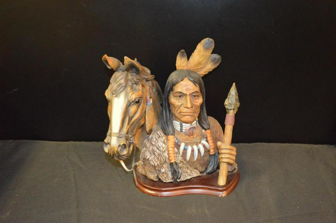Native Indian Porcelain Figurine: Native Indian Porcelain Figurine. Indian Man holding a spear with a horse's head in the background. Figurine on a wooden stand. Measures 11 1/2" tall.