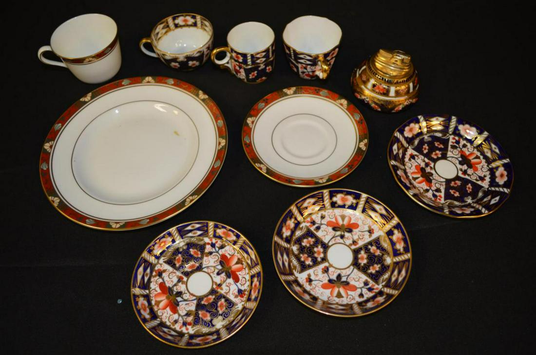 Group of Royal Crown Derby China: Cloisonne and 6299 patterns. Four saucers, 5" to 5 1/2"dia., a salad plate, 8 3/4"dia., four teacups, 2" to 3"h. and a lighter, 3"h.