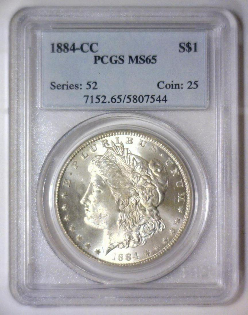 1884-CC Morgan Silver $1 Carson City PCGS MS65: 1884-CC Morgan Silver $1 Carson City PCGS MS65. Struck at the sought after Carson City Mint, this one is a blazer with nice original lustrous surfaces. Graded Gem BU MS65 by PCGS.