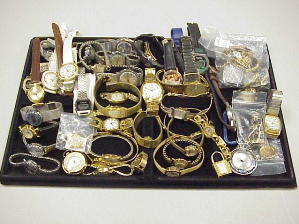 Box lot of 50 Men's & Women's Watches