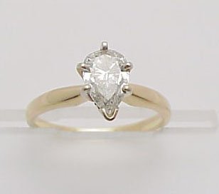 Pear Shape Diamond Solitaire Ring: 14kt yellow gold Pear shaped diamond solitaire ring 1 ct, I1, I color; size 7 1/2, 2.9 gr.