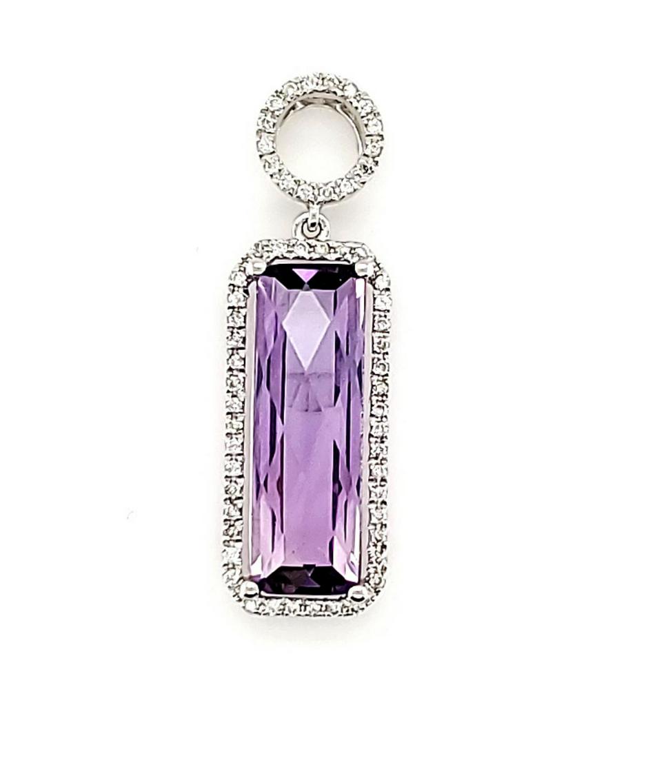 14kt white gold amethyst and diamond pendant: Ladies 14kt white gold amethyst and diamond pendant featuring a prong st rectangular checkerboard cut amethyst weighing approx. 3.80ct.. Accented with a halo and circle bail of prong set round diamond