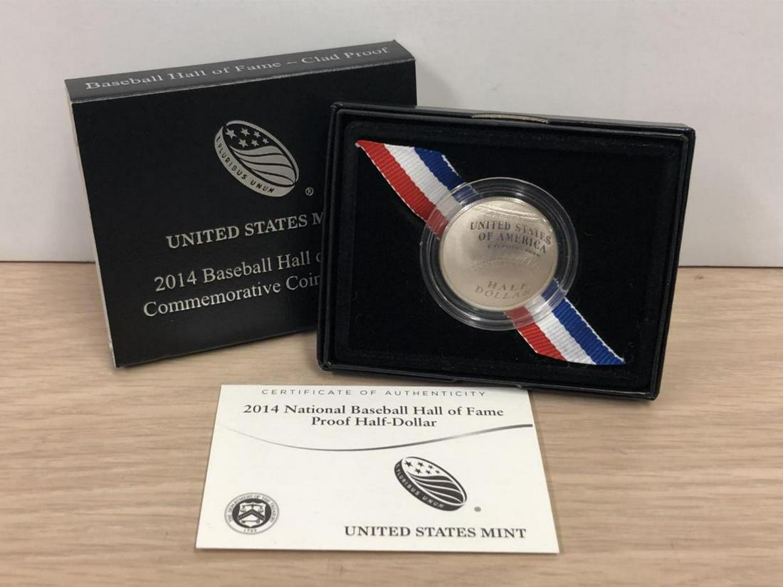 2014 Baseball Hall of Famed Proof Commem. Half: 2014 Baseball Hall of Famed Commemorative Clad Half. First curved coin the US Mint has produced. One side features a baseball, the other side a baseball glove. Proof struck with mirrored fields and fr