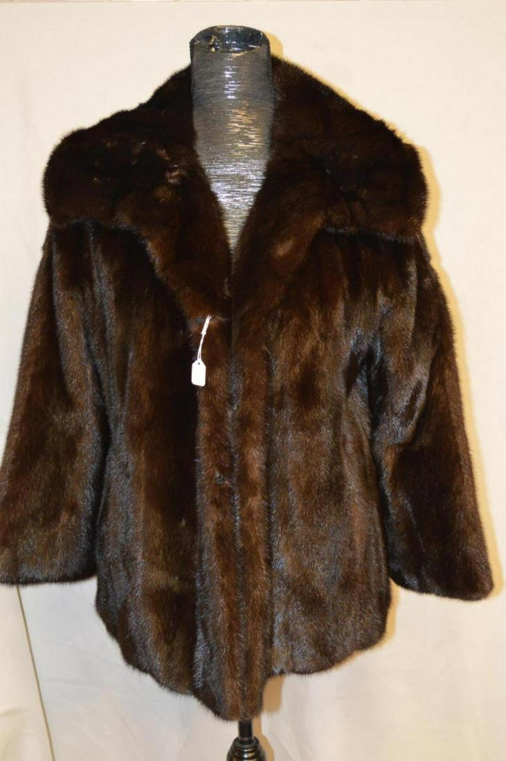 Ladies Mahogany Brown Mink Fur Coat: Ladies Gorgeous Mahogany Brown Mink Fur Coat. This great jacket from Hudson's Furs, is fully lined & features two front waist pockets & one interior pocket. Excellent condition & appears free of any r