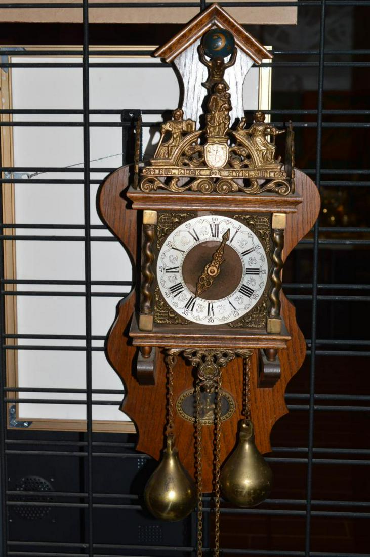 Vintage Dutch Atlas Zaandem Pendulum Wall Clock: A Beautiful vintage Dutch Zaandem Zaanse "Atlas" pendulum wall clock with mahogany or oak wood case made in Holland. The movement was made in Germany. It features Atlas at the top of the clock bearing
