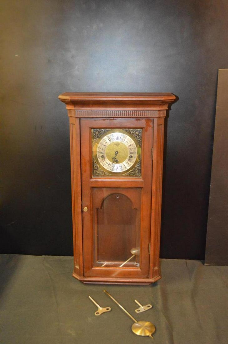 Ethan Allen Wall Clock: Ethan Allen Wall Clock. Comes with 2 keys. Upper back part missing. Franz Hermle No(0) Jewels Unadjusted made in Germany. 351-020 45cm 101.887 is on the back. Wood stained finish. Not in working condi