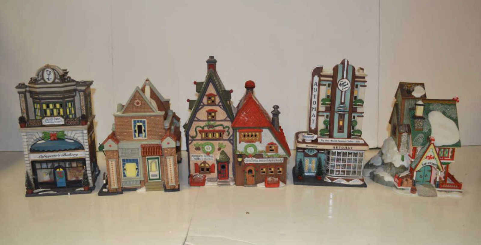 Lot Of Department 56 Cottages: Lot Of Department 56 Cottages. Total of 5 in the lot. Consists of Clark Street Automat. White Swan Catering Service Lafayette's Bakery. Mrs Stovers Bungalow Candles Sweet Rock Candy Co. Obbie's Books,