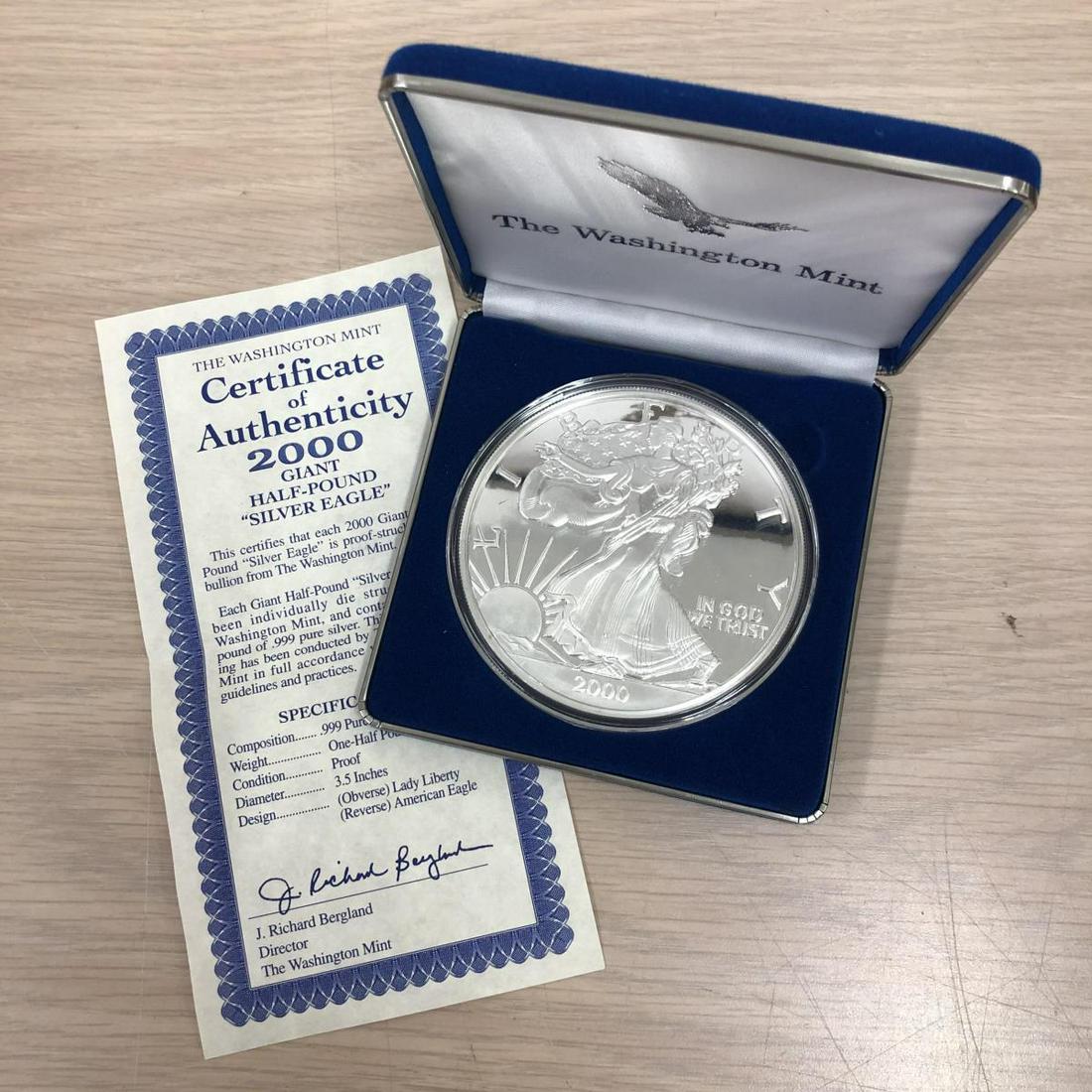 2000 Half-Pound Proof Silver Eagle 8 oz. Medal: 2000 Half-Pound Proof Silver Eagle 8 oz. Medal. This 8 ounce .999 fine silver medal is in the style of the American Silver Eagle bullion coin and is a whopping 3.5" in diameter. Medallion is in a hard