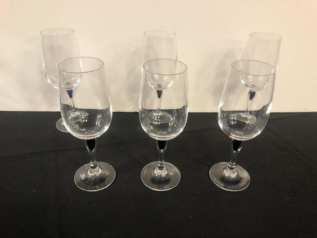 Lot of 6 Courvoisier Blue Teardrop Wine Glasses: Lot of 6 Courvoisier Blue Teardrop Wine Glasses. Made in France, these 6 offer the blue sapphire drop design. Each one is 6.5” in height and have the Courvoiser marking on the bottom. No flaws noted