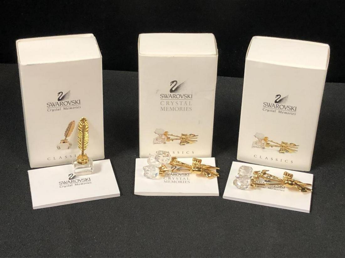 Swarovski Crystal Memories Inkwell & Quill & Roses: Swarovski Crystal Memories Inkwell & Quill & Roses. Contains 3 boxes, one is of the Inkwell & Quill, the other two are a Trio of Roses, however one of them has lost a rose, and only shows two roses. M