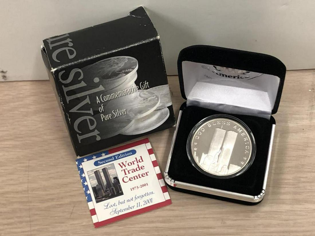 Twin Towers WTC 1 oz Silver Proof Medal: Twin Towers WTC 1 oz Silver Proof Medal. This World Trade Center medallion is proof struck and is 1 ounce .999 fine silver. Housed in a plastic capsule and felt case.