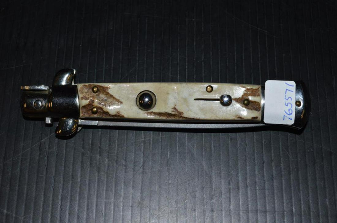 A.B. Italy Stiletto Flick Automatic Knife w Stag: A.B. Italy Stiletto Flick Automatic Knife with Stag Handles. This quality made classic design knife was built by Armando Beltrame. Push button open. 9" overall, 3 3/4" double edged blade, 5" closed, 1