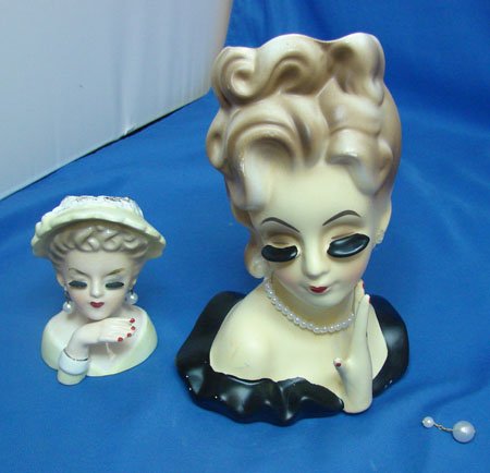 Lot of 2 Vintage Head Vases Nippon: Lot of two head vases, 7" tall vase is marked handpainted Nippon and has some small paint loss in a few spots, has orig. pearls & earring came loose, 3 1/2" tall vase is marked Inarco, no chips or cra