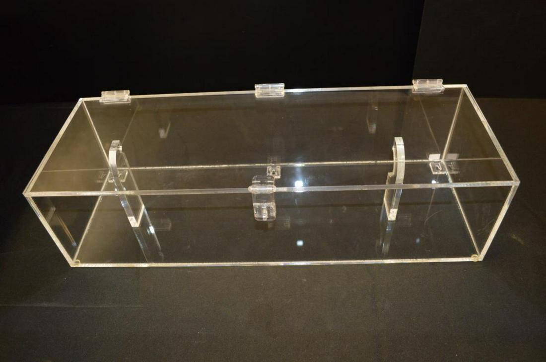 Lot Of Lucite Rectangle Wall Hanging Display Case: Lot Of Lucite Rectangle Wall Hanging Display Case. Measures 24 1/2"x6 1/2". Case comes with latch and lock. Has minor scratches otherwise in great condition. Great piece for displaying knives, swords,