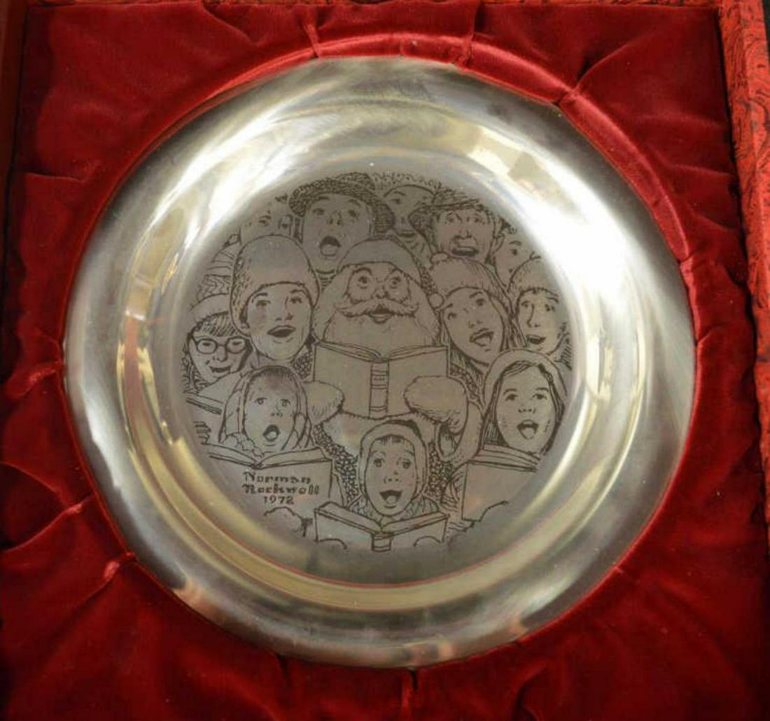 Sterling Silver Norman Rockwell Christmas Plate 72: Sterling Silver Norman Rockwell Christmas Plate 1972 in Original Box. Titled "The Carolers". The original red box with Christmas wreath relief lid is lined with red satin & felt with original cushion