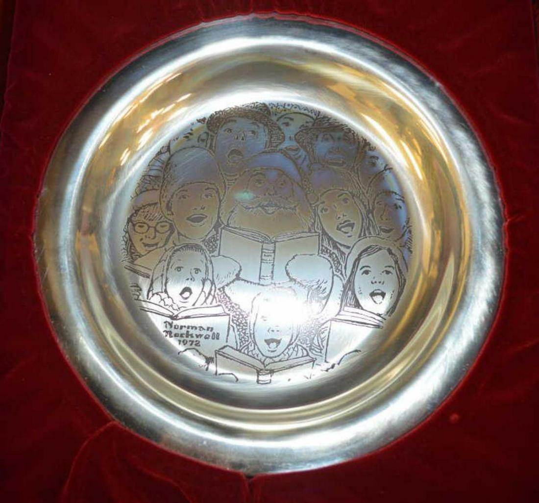 Sterling Silver Norman Rockwell Christmas Plate 72: Sterling Silver Norman Rockwell Christmas Plate 1972 in Original Box with Numbered COA Titled "The Carolers". The original red box with Christmas wreath relief lid is lined with red satin & felt with