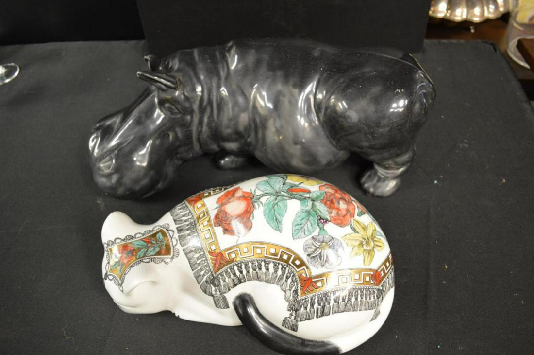 Pair Of Ceramic Porcelain Hippo & Cat: Pair Of Ceramic Porcelain Hippo & Cat. Hippo stands 6 1/2" tall and measures 16" long. Black appearance to the hippo. Has crazing through out it. White cat has floral pattern both on it's back as well