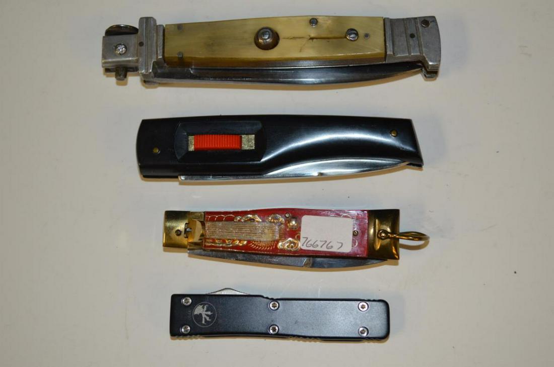 Group of 4 Different Types of Automatic Knives: Group of 4 Different Types of Automatic Knives Including a large "push-button" locking back knife with yellow horn grips, 4 1/4" blade. Also included is a lever open knife with a bayonet blade with br