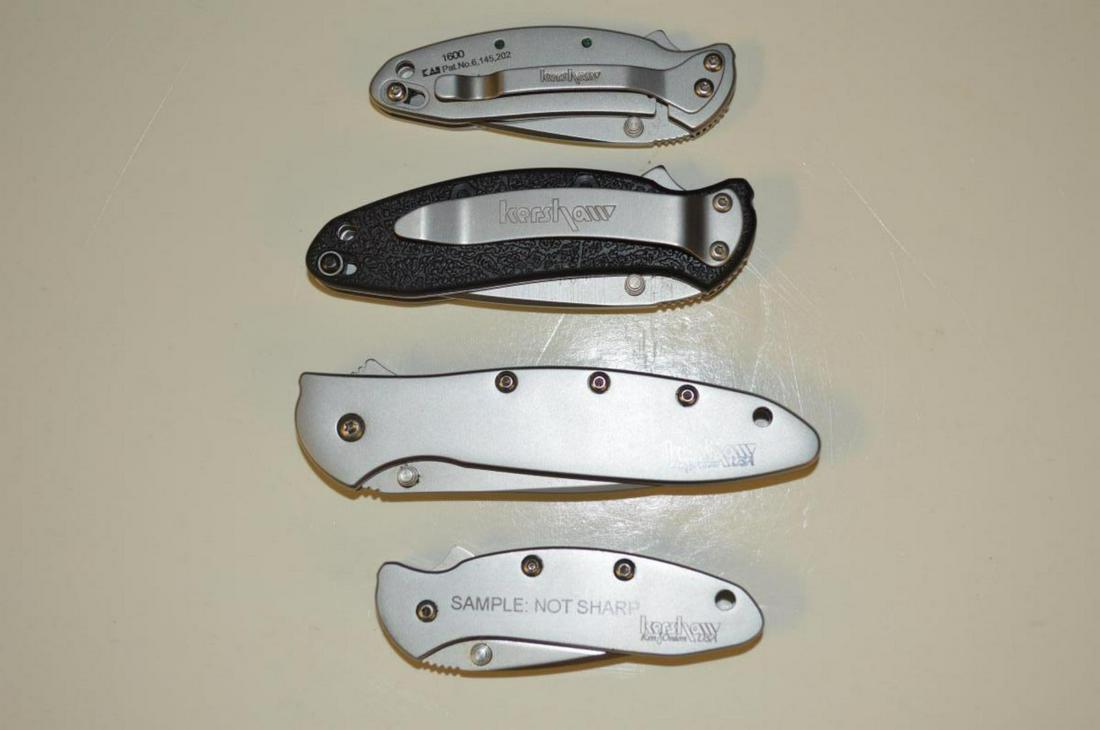 Lot of 4 Kershaw Open Assist Pocket Knives: Lot of 4 Kershaw Open Assist Pocket Knives. All in new condition, never used, never sharpened. This listing will include a rare "Sample knife" model 1600, imprinted with Sample: Not Sharp on side 2" b