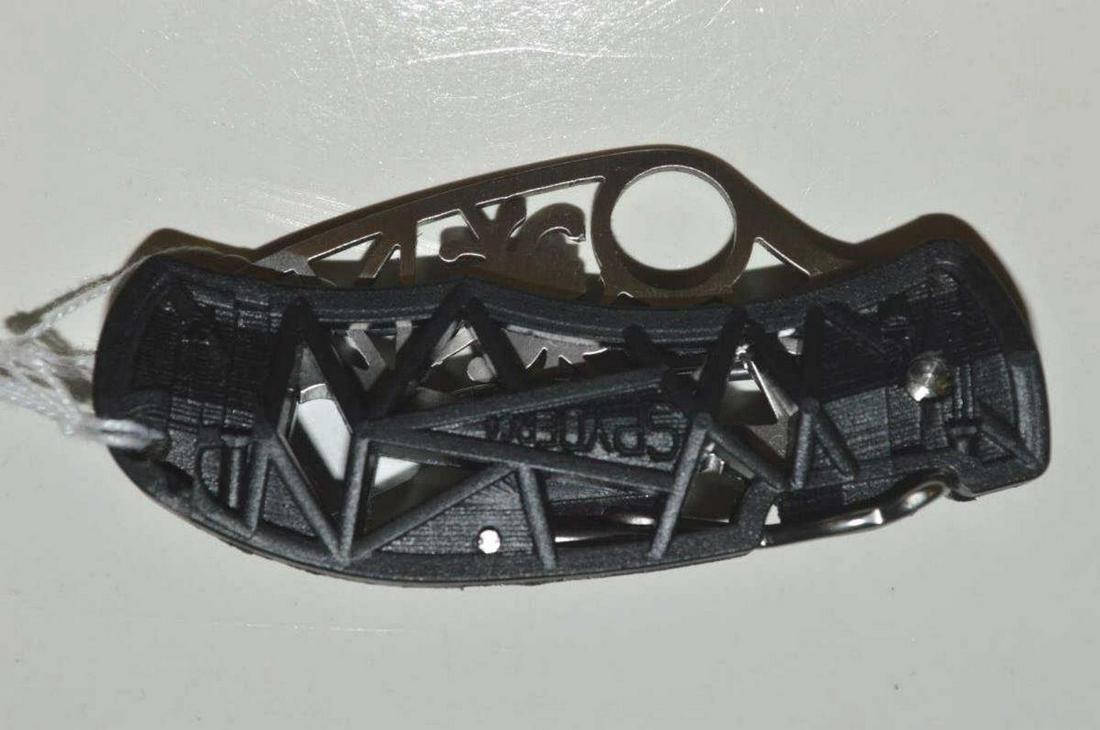 Spyderco C35 Skeletonized Folding Pocket Knife: Spyderco C35 Skeletonized Folding Pocket Knife with Black Handle with Removable & Switchable Pocket Clip. Hard to find & discontinued; collectible knife. 2 1/2" blade, 5 3/4" overall, 3 3/8" folded. L