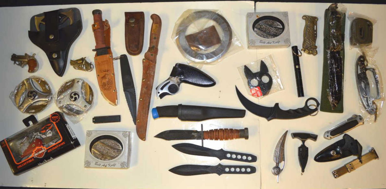 Group of Interesting Knives Automatic OTF Folding: Group of Interesting Knives, Including; Automatic, OTF, Folding, Fantasy, Belt Buckle, Boot, Straight, Non-Metallic, Throwing. Way too many to list. approx. 29 pieces plus sheaths & more. Please exami